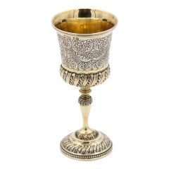 Silver chalice with circular base and reliefs