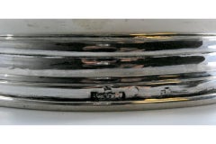 Silver chamber pot with circular base reliefs and knob on the removable lid