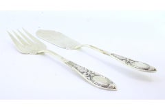 Silver cheese knife and fork