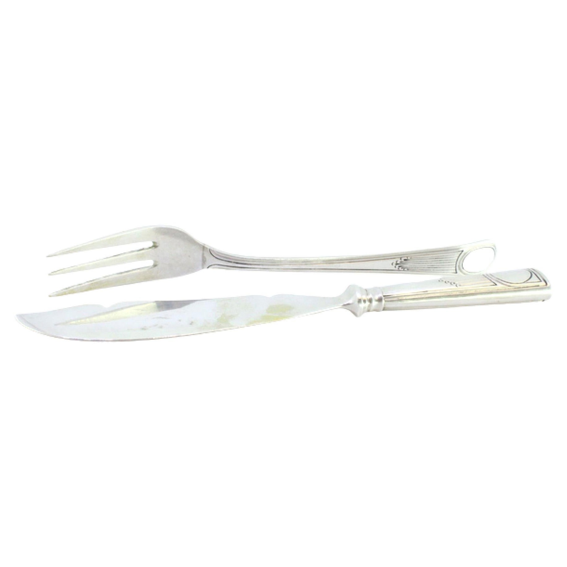 Silver cheese knife and fork set with exposed handles enclosing monogram cards