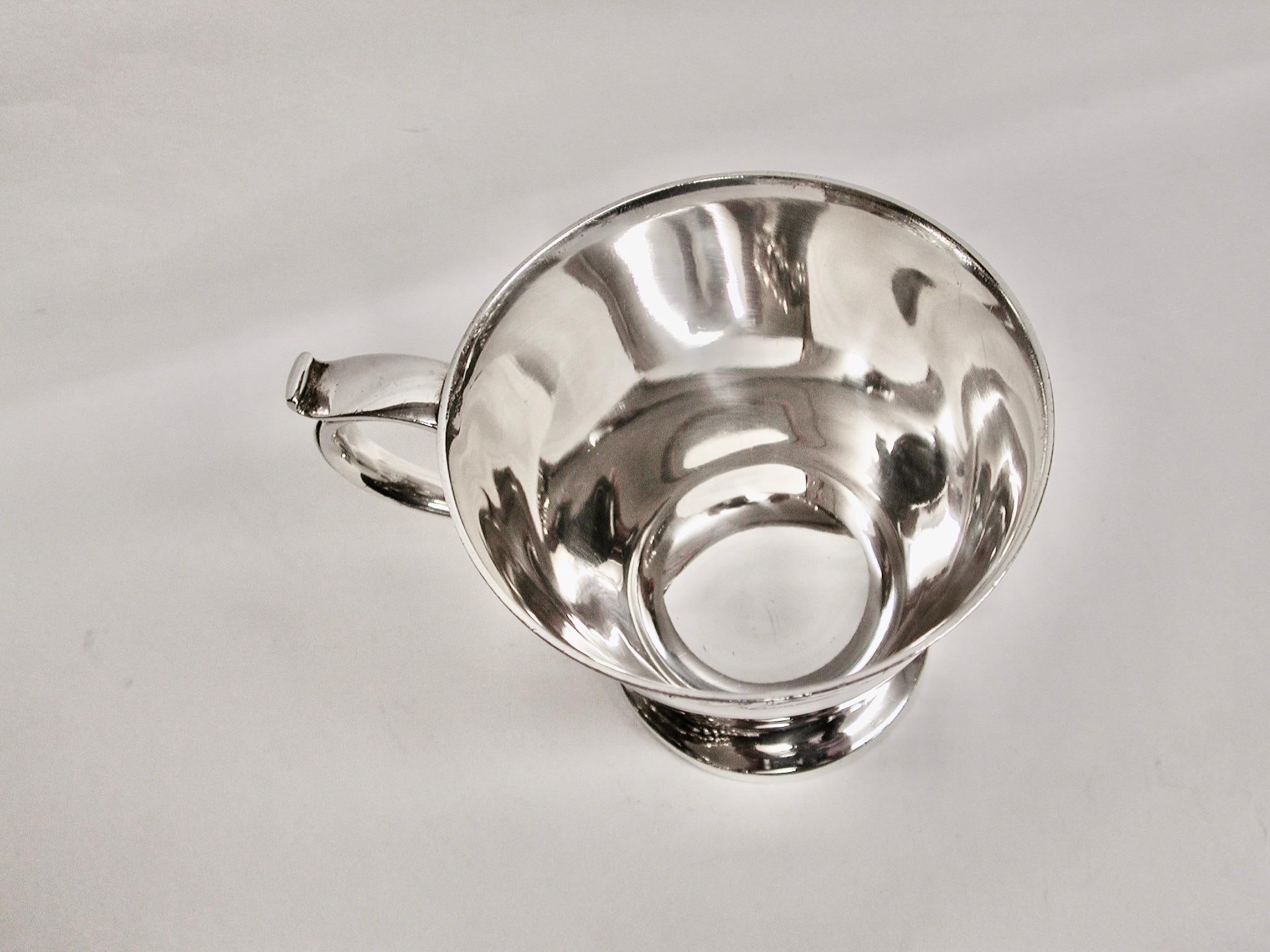 English Silver Childs Mug with Mythical Scenes, Thomas Bradbury and Sons, Sheffield, 1936 For Sale