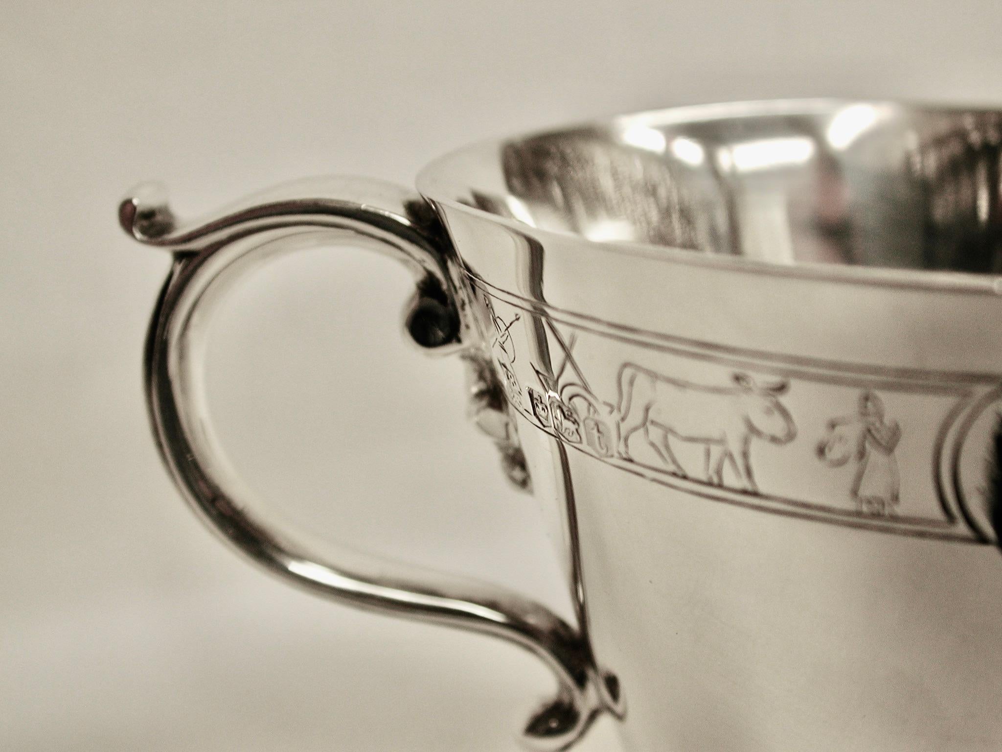 Mid-20th Century Silver Childs Mug with Mythical Scenes, Thomas Bradbury and Sons, Sheffield, 1936 For Sale