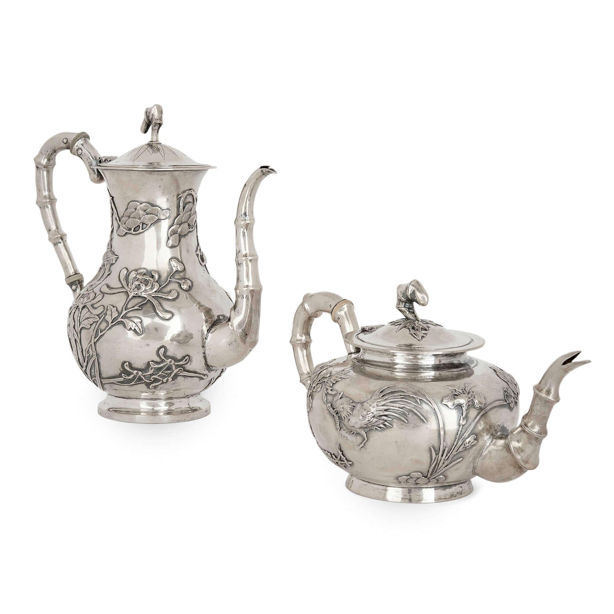 Silver Chinese Export tea and coffee service, by Tuck Chang & Co., Shanghai
Chinese, Late 19th century
Measures: Milk jug: height 8cm, width 14cm, depth 10cm
Coffee pot: height 25cm, width 24cm, depth 14cm
Total weight: 3,446 grams.

Bearing