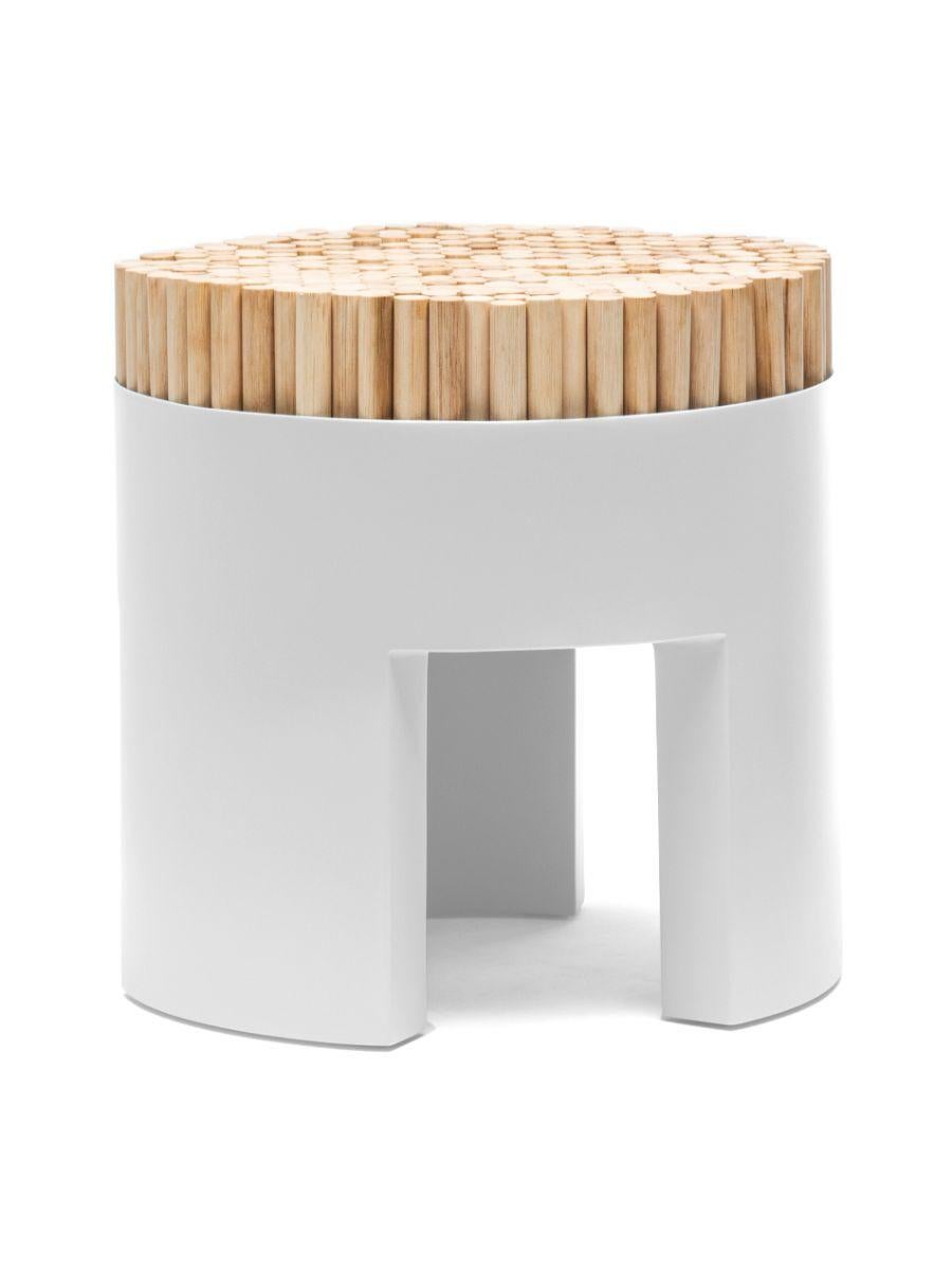 Chiquita silver stool by Kenneth Cobonpue.
Materials: Rattan, polyurethane foam, steel. 
Dimensions: Diameter 45 cm x height 46cm. 

Chiquita is a bundle of charms with its clever design and functionality. The Chiquita stool’s vertical sections