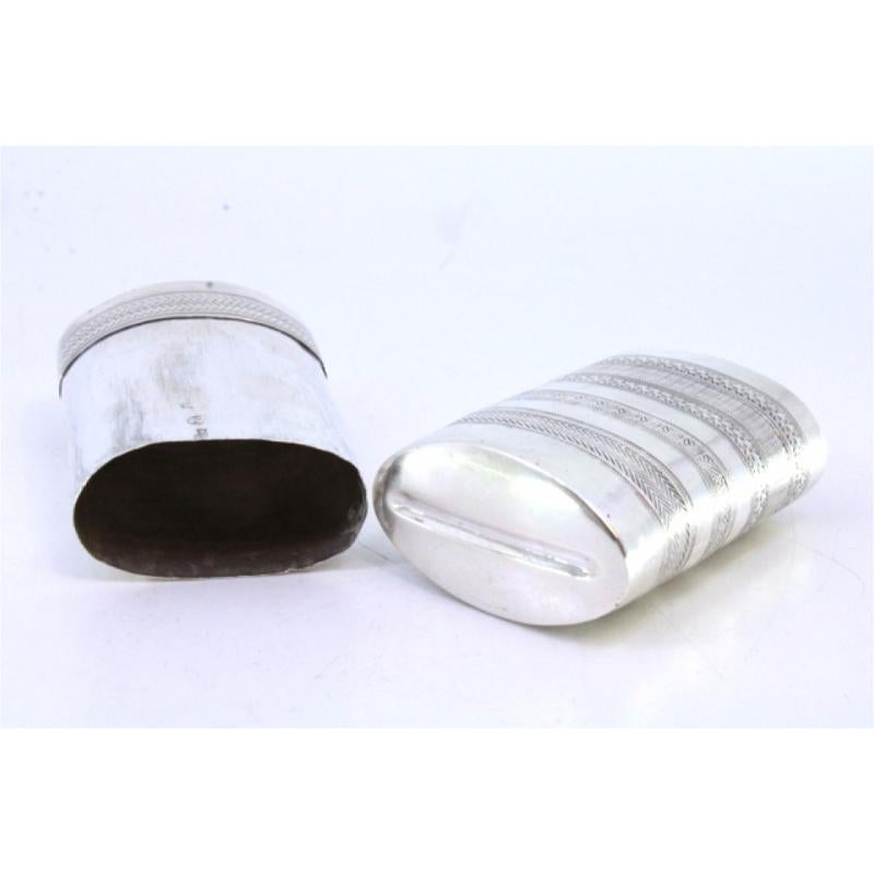 Description: Silver cigar case with engraved wreaths and friezes around the lid. Metal: Silver. Origin: European. Mark: Unreadable. Weight: 71.99 grams. Dimensions: 9cmx5cm. Content: 925/1000. Assay Mark: Yes, unreadable. Additional information: