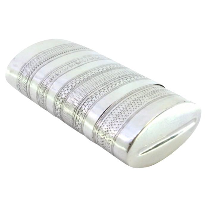 Silver cigar case with engraved wreaths and friezes around the lid