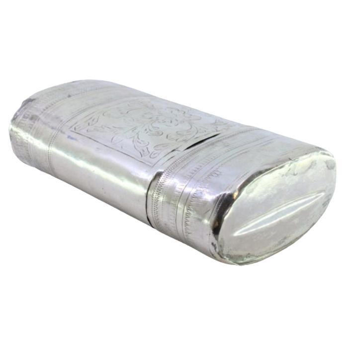 Silver cigar case with engraved wreaths and friezes around the removable lid