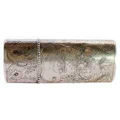 Silver cigar case with wreaths, florals, hunting scene and pearled lid frieze