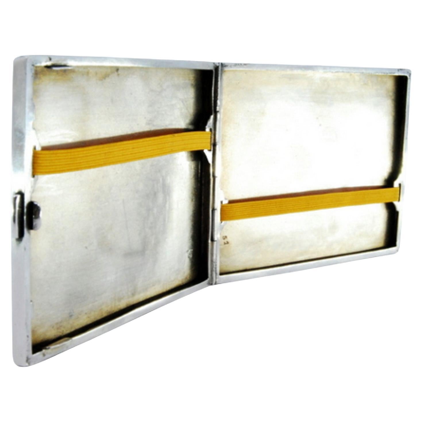 Silver cigarette case w/ engraved geometric figures, hinged lid 
gold interior For Sale