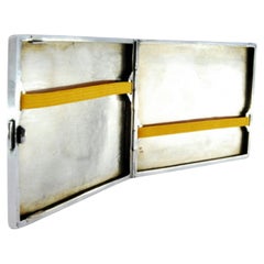 Silver cigarette case w/ engraved geometric figures, hinged lid & gold interior