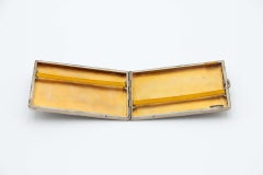 Silver cigarette case with asymmetrical patterns