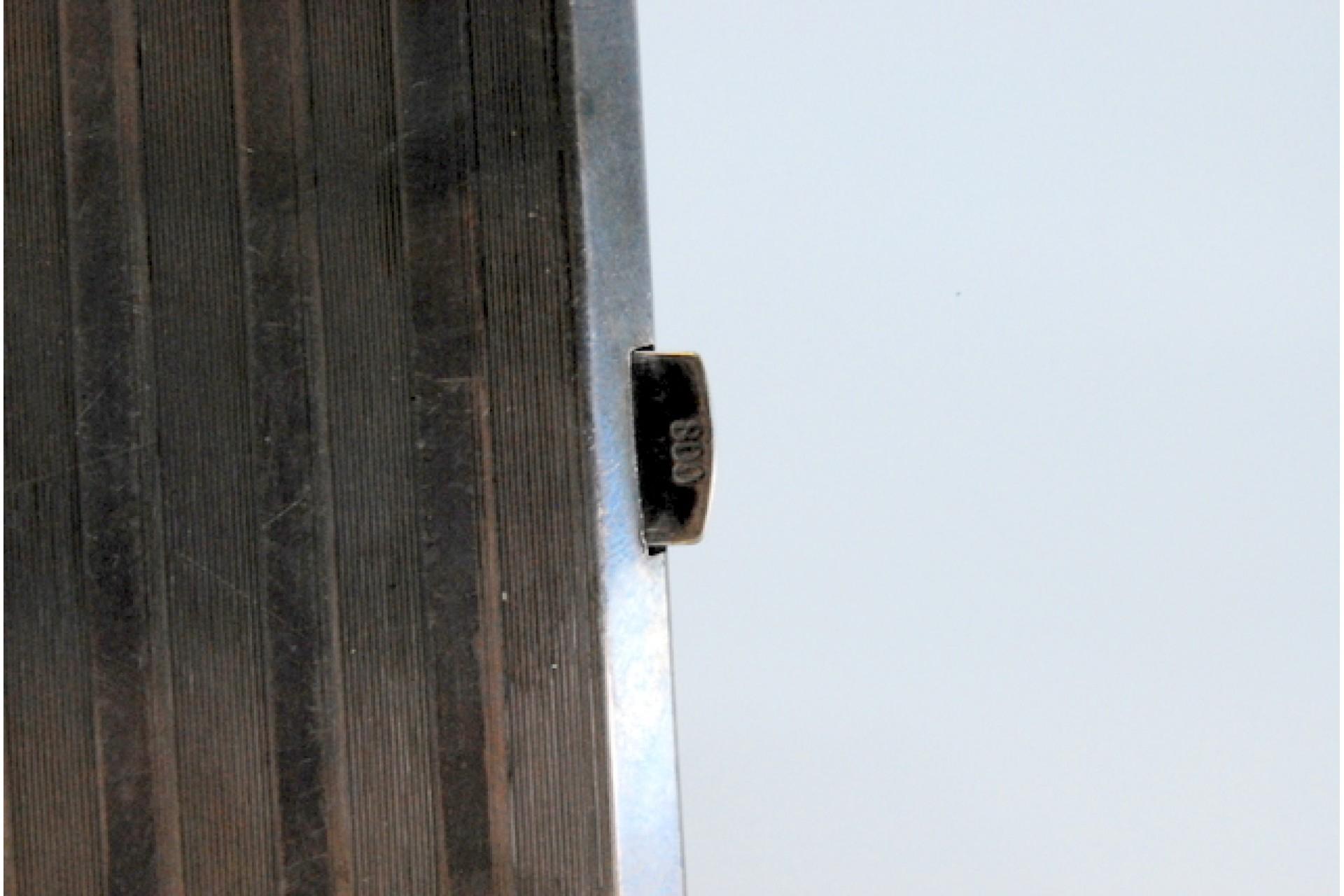 European Silver cigarette case with bands along the length, gold interior and hinged lid For Sale