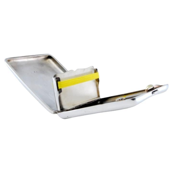 Silver cigarette case with curved bands 
divided interior For Sale