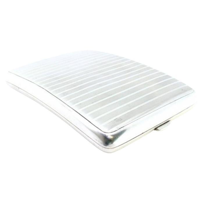 Silver cigarette case with curved guilloche bands at the top