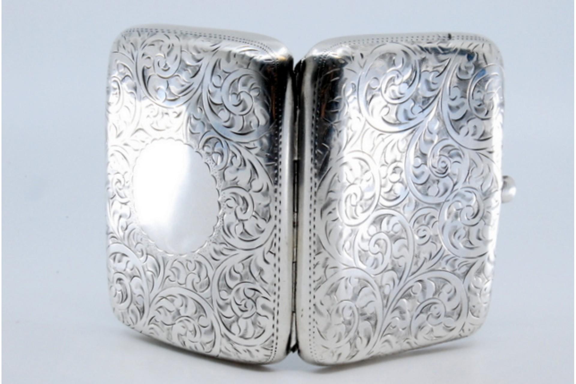 European Silver cigarette case with engraved floral motifs and hinged lid For Sale