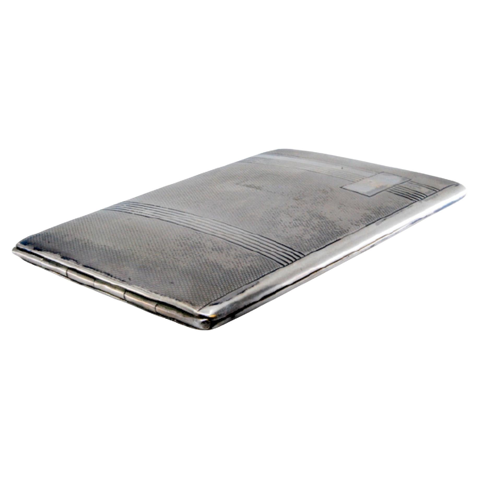 Silver cigarette case with guilloche bands at the top and hinged lid
