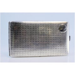 Silver cigarette case with guilloche bands & monogram card