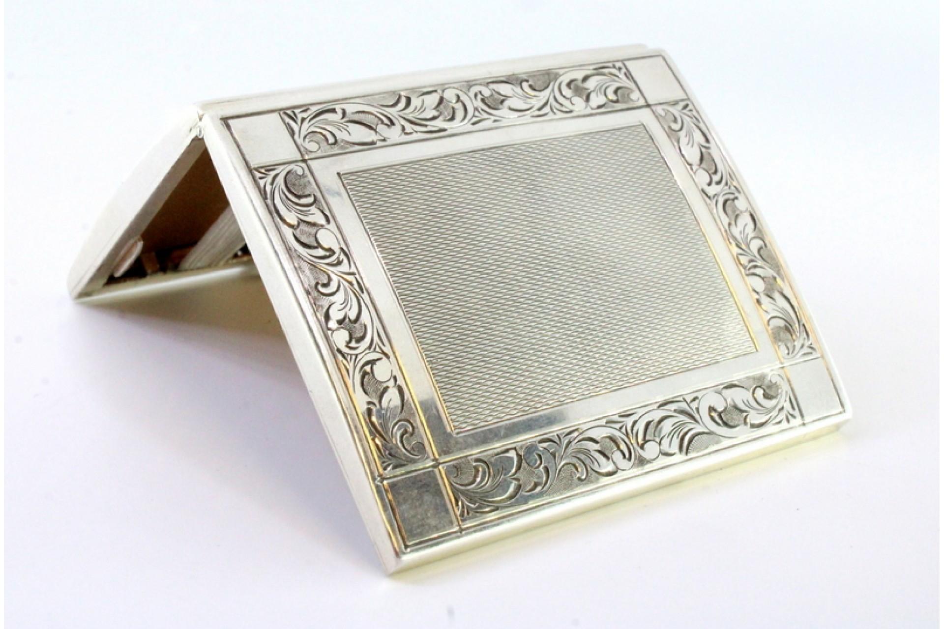 European Silver cigarette case with reliefs, brushed silver lid and base trims For Sale