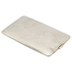 Silver cigarette case with reliefs