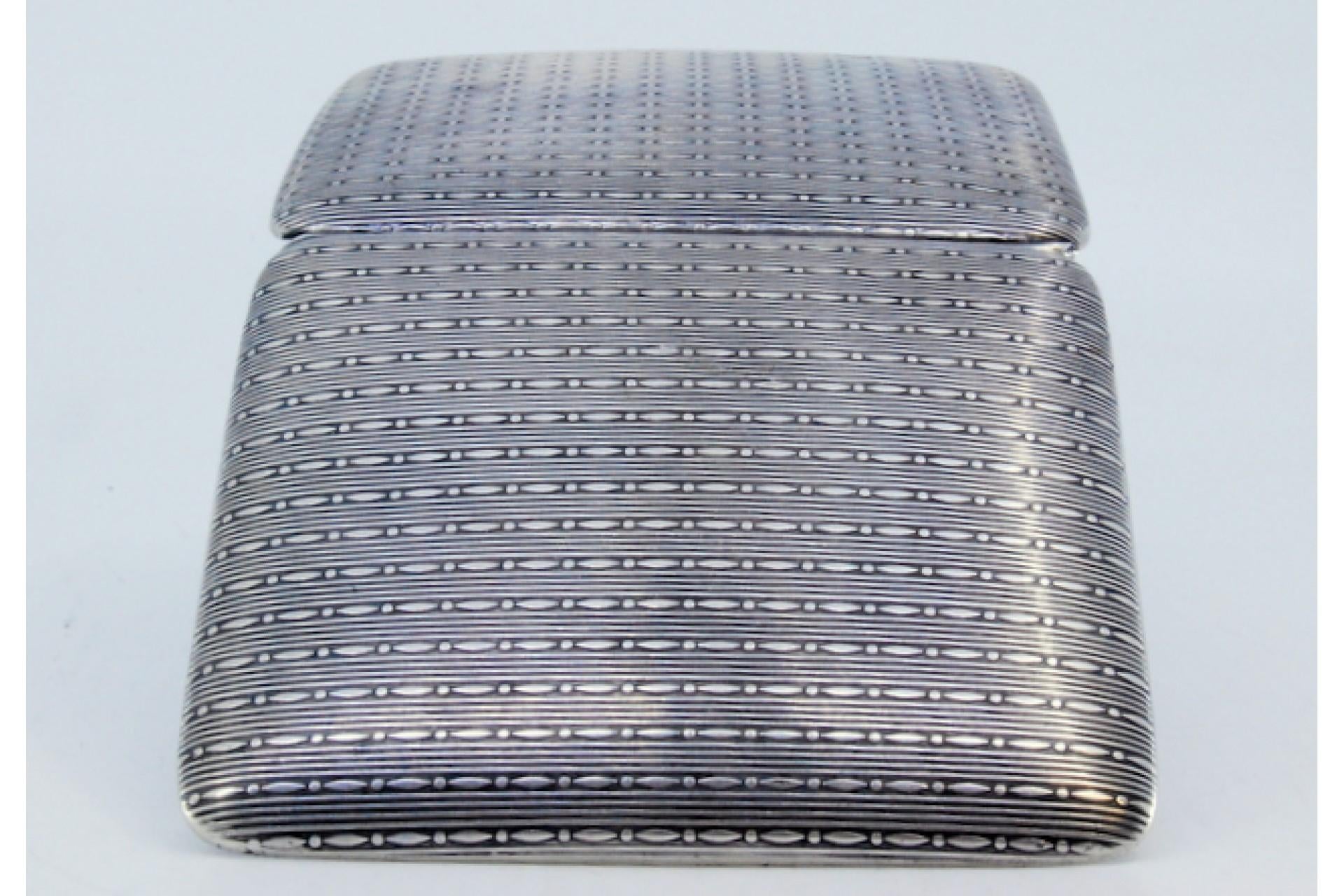 20th Century Silver cigarette case with square-shaped chiseled reliefs and a hinged lid For Sale