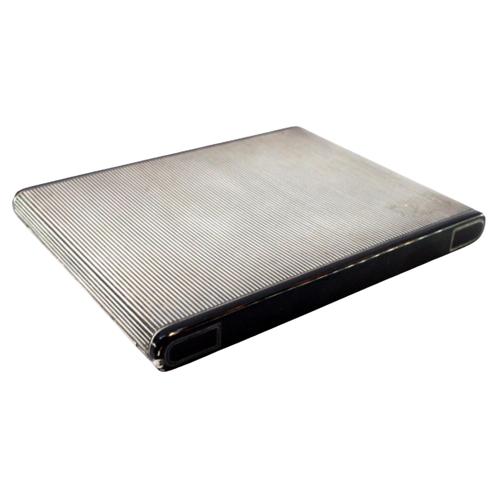 Silver cigarette case with top trim, gold interior and snap-on lid