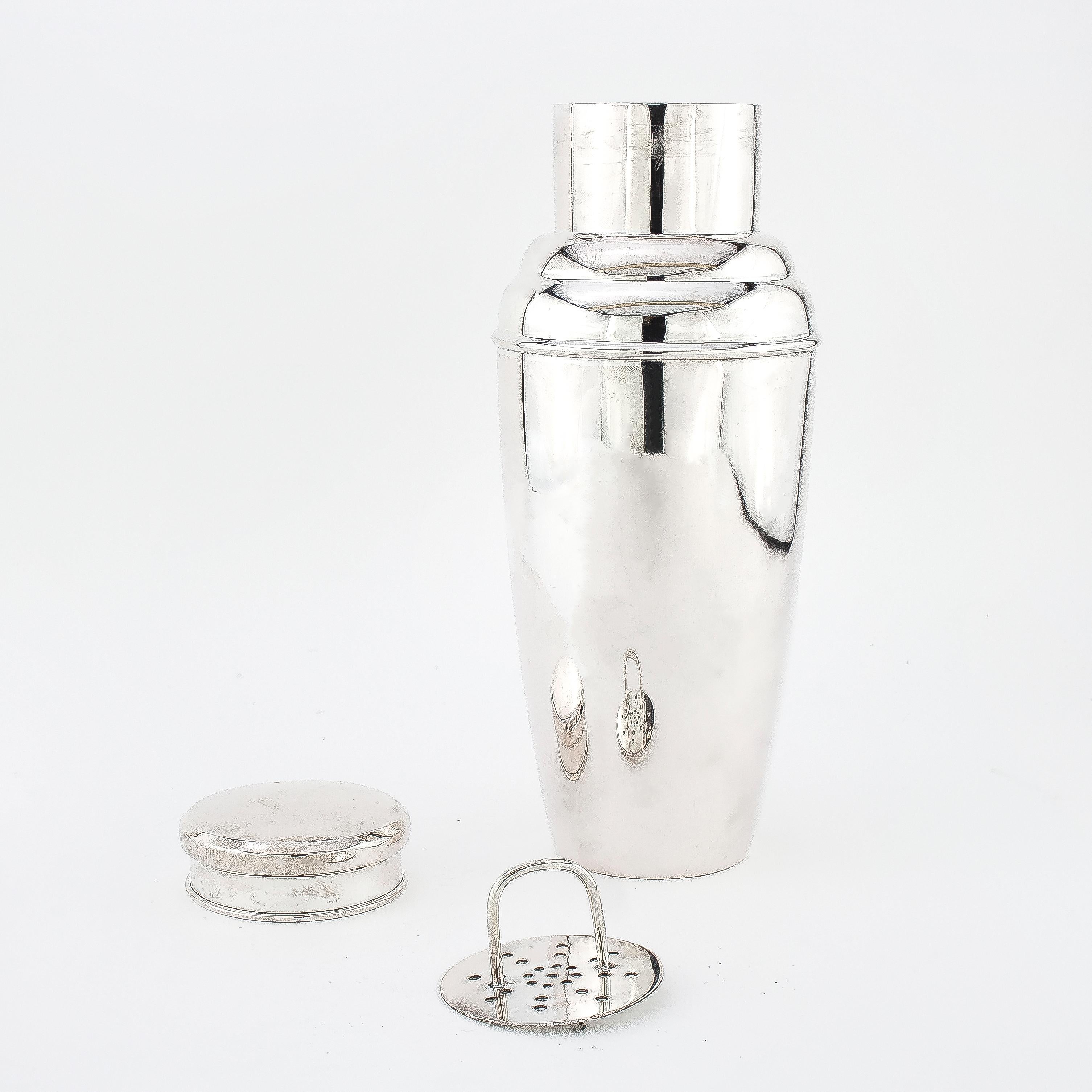 Silver cocktail shaker
Maker: Unknown
Possibly American,
circa 1950s

Dimensions: 
Diameter x height 9 x 21.5 cm
Weight: 354 grams

Condition report: Shaker has some surface wear and tear from general usage and some age wear, no damage,