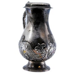 Silver coffee maker w/ floral reliefs on the base, smooth lid & embossed handle Antique Silver coffee maker w/ floral reliefs on the base, smooth lid & embossed handle