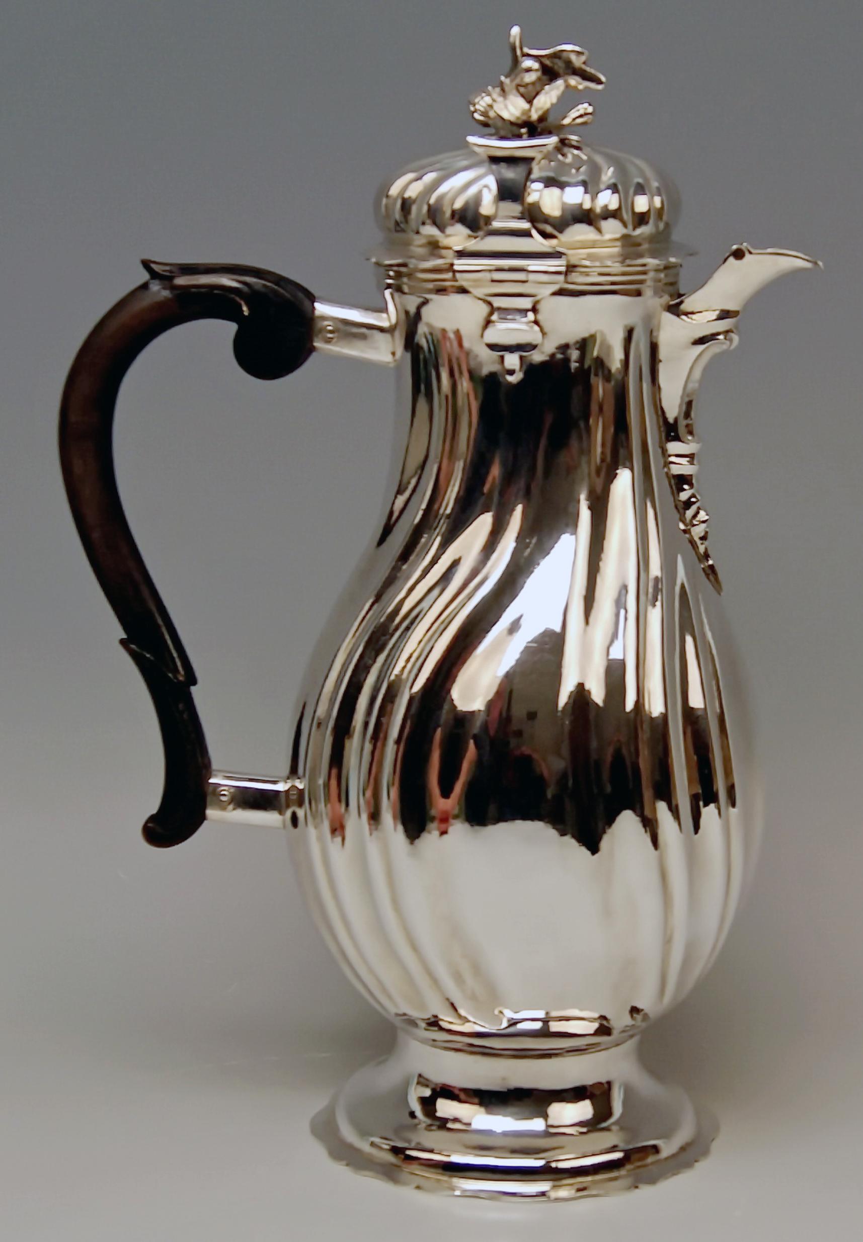 Gorgeous Coffee Pot of Rococo Period / form type: pear.

Made in Augsburg 1775-1777
Jakob Wilhelm Kolb (born c. 1743 in Stuttgart/Germany - died 1782) / he became master in year 1768.

Specifications:
Made of silver / finest manufacturing
