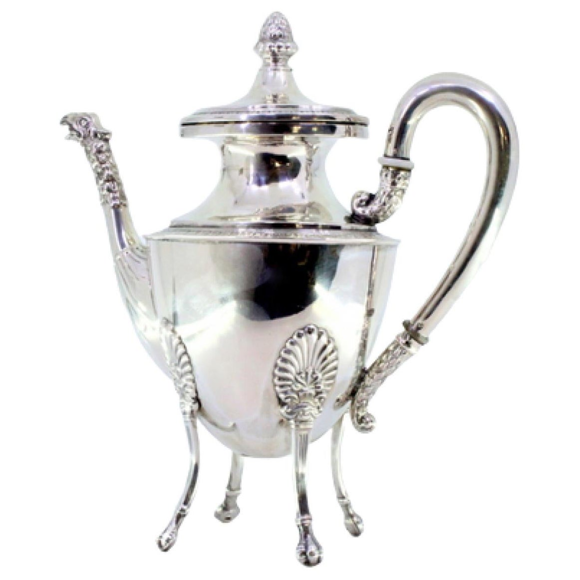 Silver coffee pot w/ reliefs 
friezes, resting on four raised claw-shaped feet