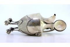 Silver coffee pot with fluting, lion figures and claw-feet on balls
