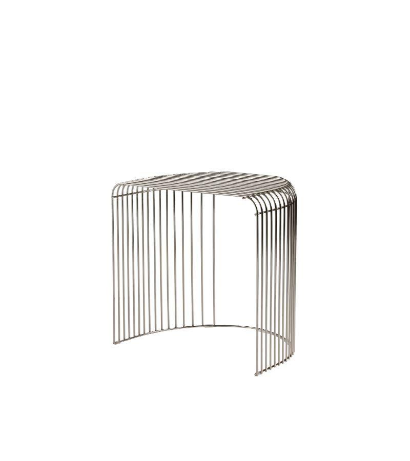 Silver contemporary side table
Dimensions: L 34 x W 48 x H 45 cm 
Materials: Steel.
Also available in gold and black.


The ever-popular CURVA collection is growing with a minimalistic, graceful, and multifunctional side table. As with any