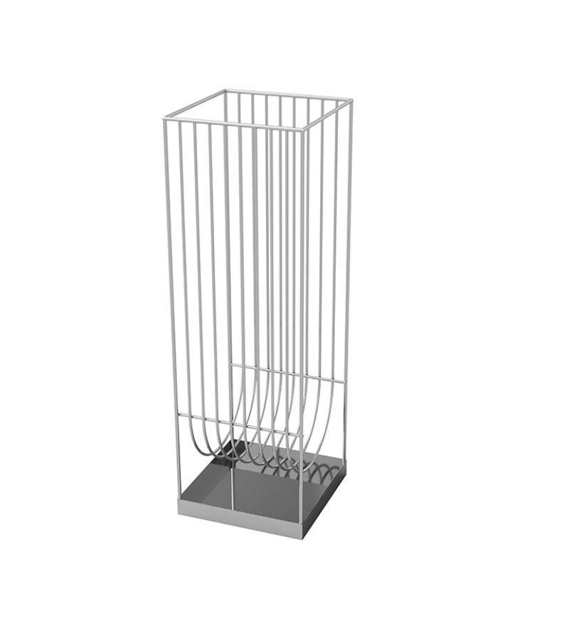 Silver contemporary umbrella stand
Dimensions: L 18.4 x W 18.4 x H 56 cm 
Materials: Steel. Powder-coated.
Also available in gold and black. 


The Curva collection has expanded with an impressive & incredibly stylish umbrella stand and never