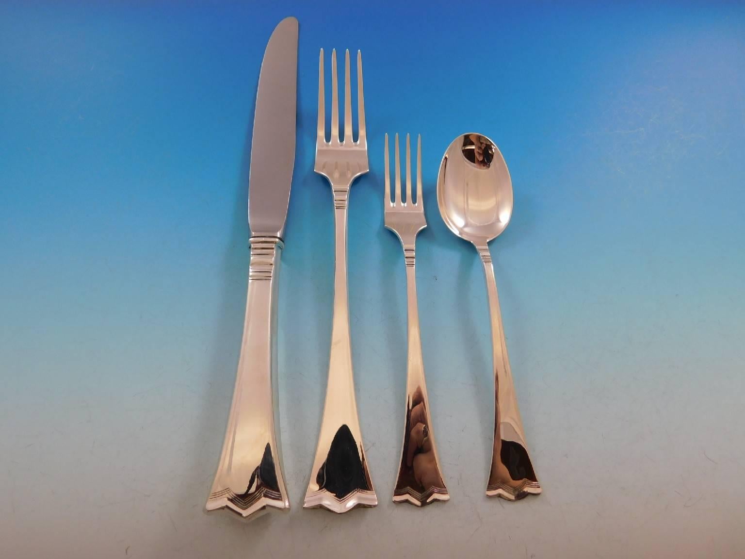 Unique silver crown AKA Kronesolv by Th. Olsens 830 sterling silver Scandinavian modern flatware set - 64 pieces. This set includes:

12 dinner knives, 9 1/4