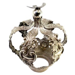 Silver crown of Virgin Mary with acanthus reliefs, cutouts and dove finial