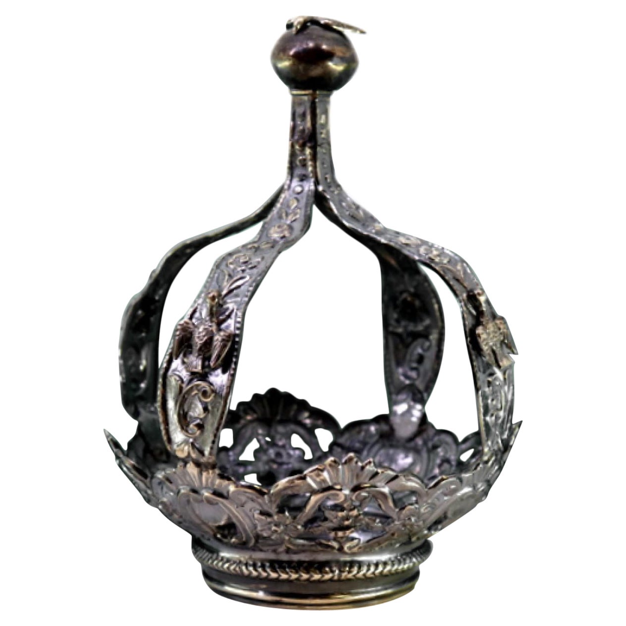 Silver crown of Virgin Mary with acanthus reliefs, cutouts and dove finial For Sale