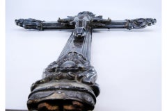 Silver crucifix w/ wooden interior w/ reliefs & applications of Jesus crucified