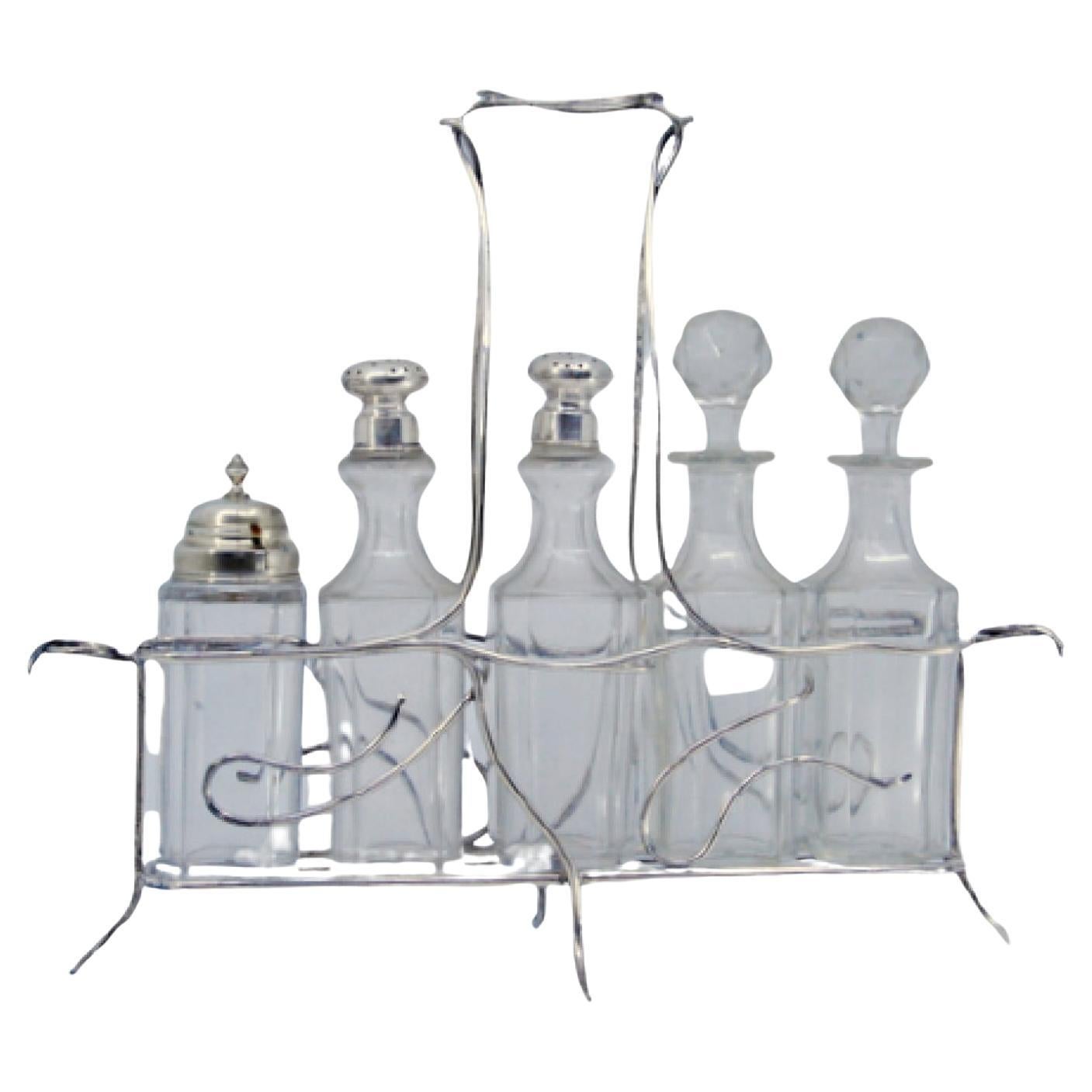 Silver cruet stand with salt, pepper, mustard pot 
lid holder For Sale