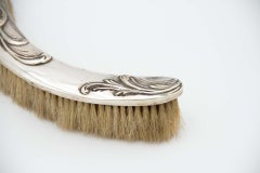 Silver crumb catcher set and embossed brush