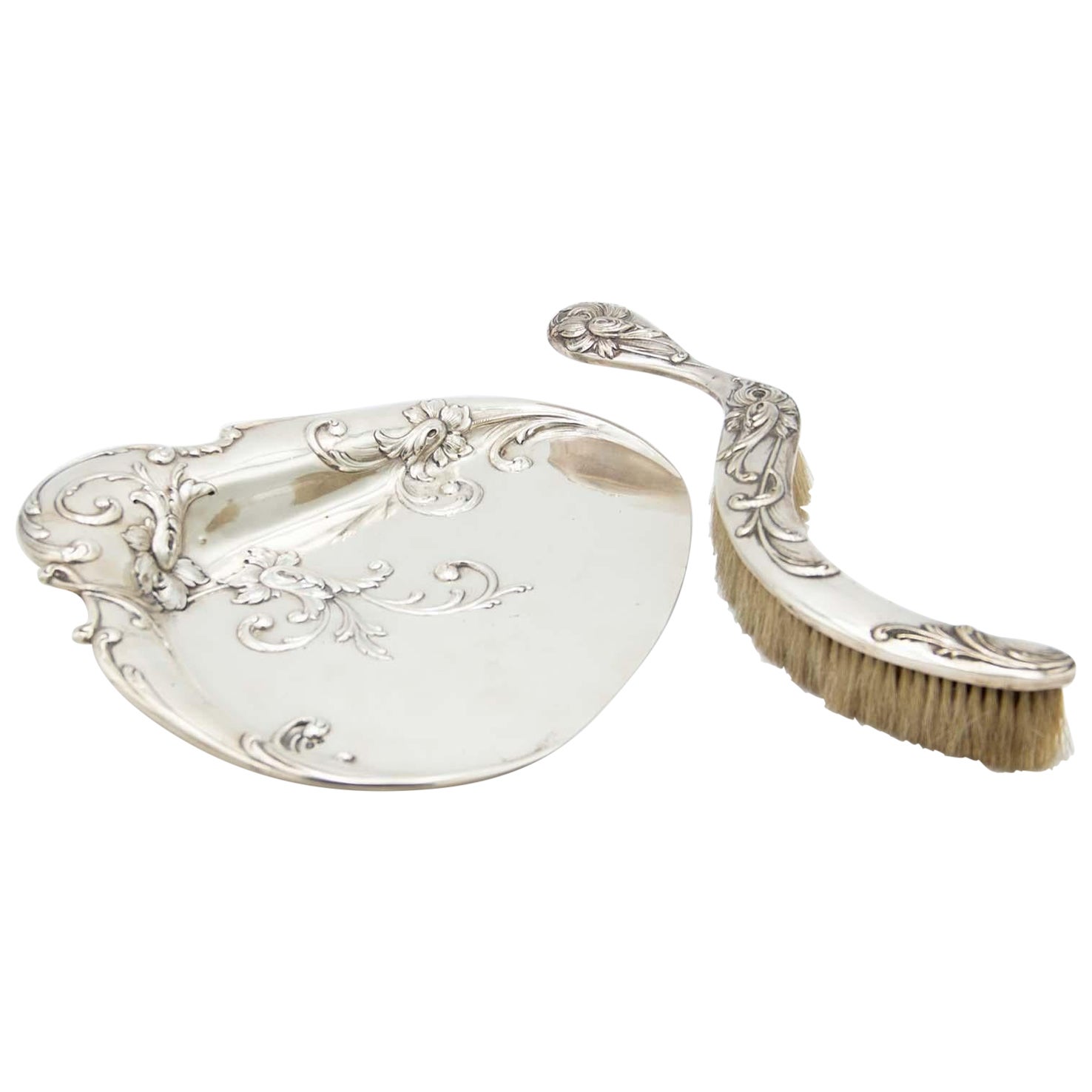 Silver crumb catcher set and embossed brush
