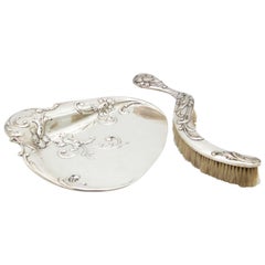 Silver crumb catcher set and embossed brush