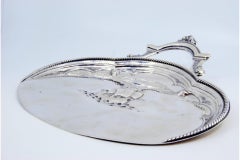 Silver crumb catcher with sailing caravel, corded frieze and applications