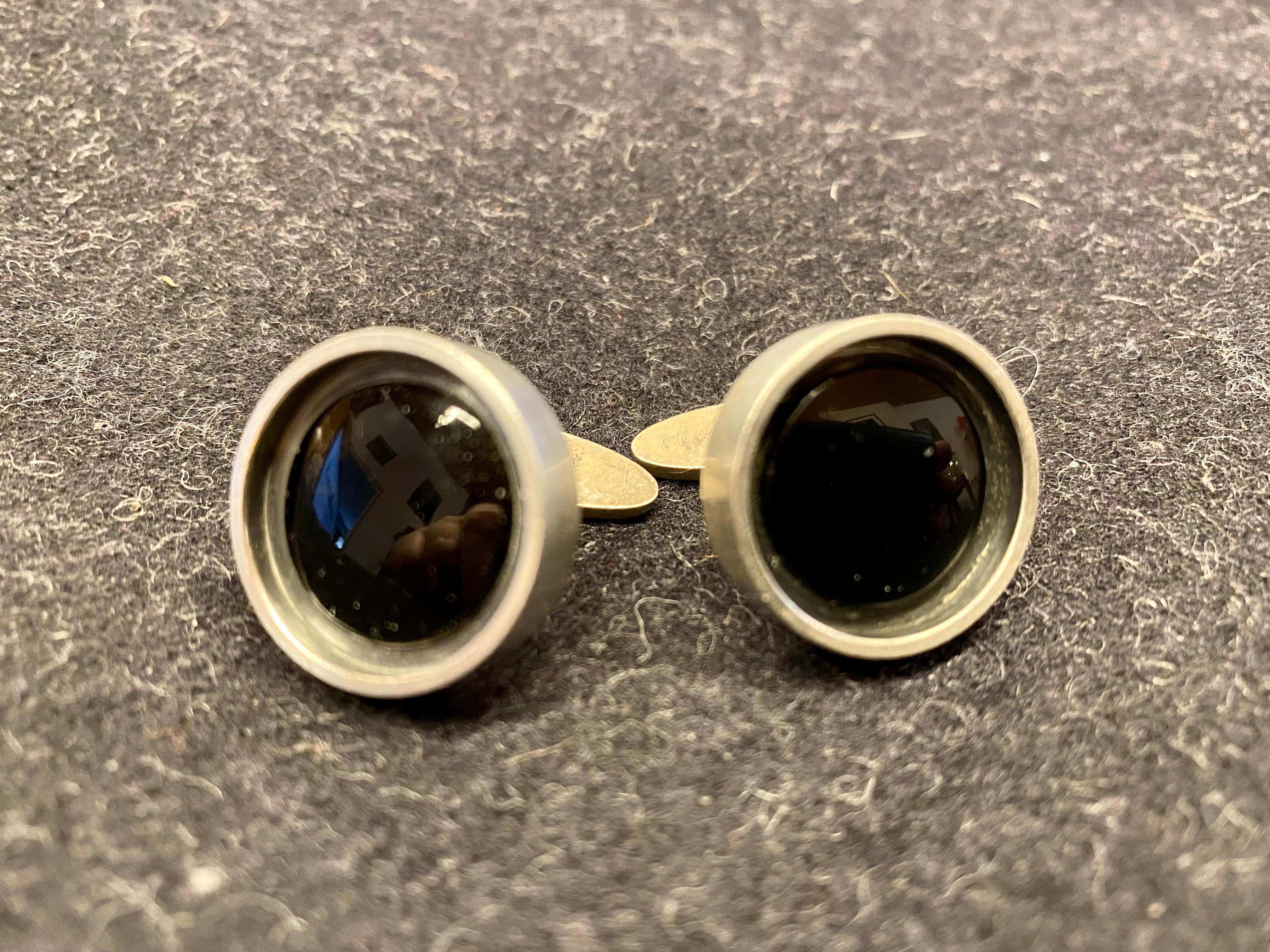 Silver Cufflinks by Elis Kauppi for Kupittaan Kulta, Finland, onyx
Made in Finland 1966
916H Silver
Turku Finland.
Engraving the letters HM.
It is very delicately made, can be easily sanded off if needed.