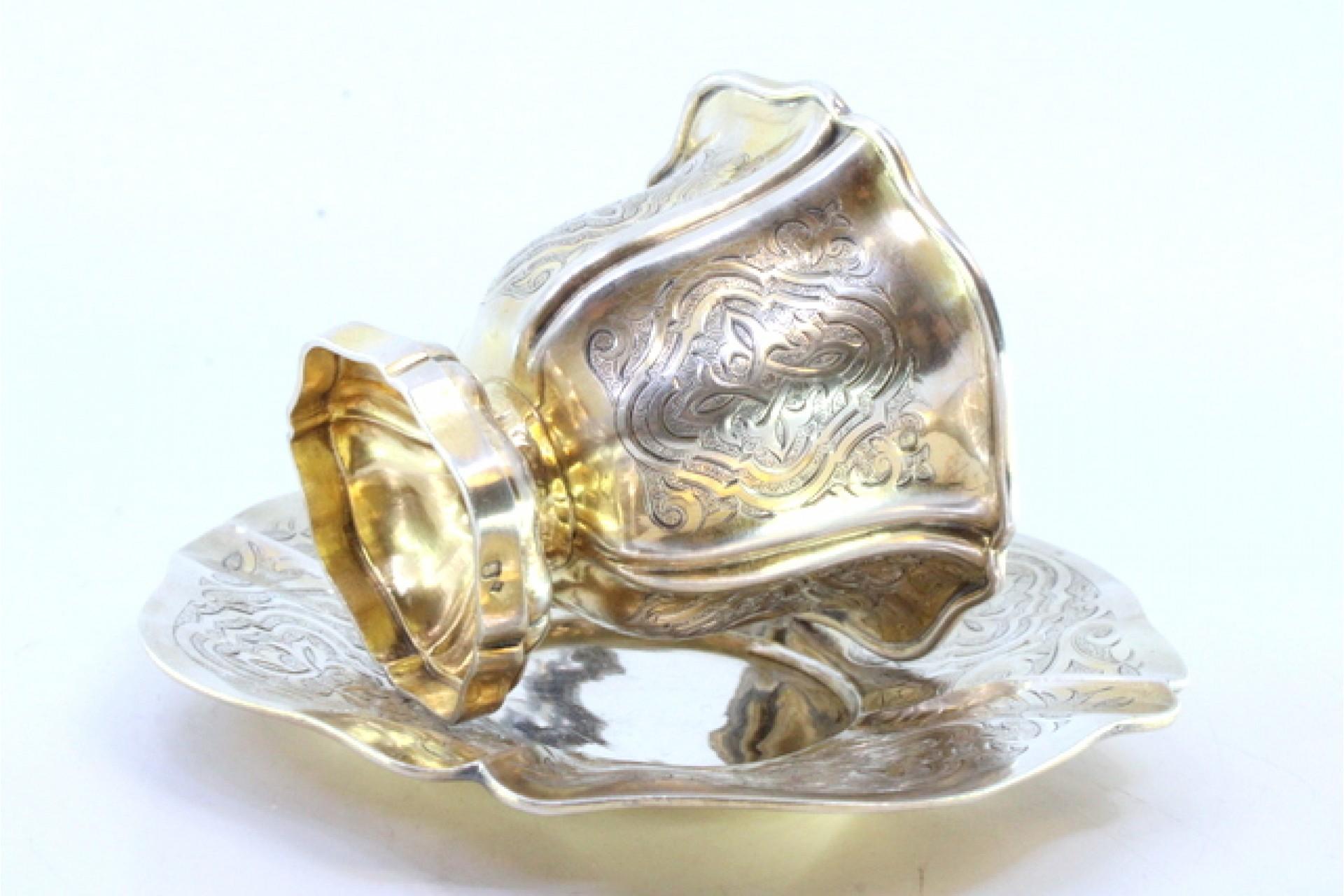 European Silver cup and saucer with engraved floral motifs and cutouts on the edges For Sale