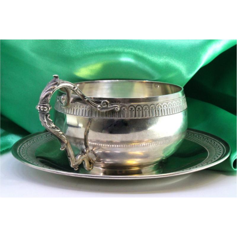 Silver cup and saucer with raised friezes on the edge and cut-out handle im Angebot 1