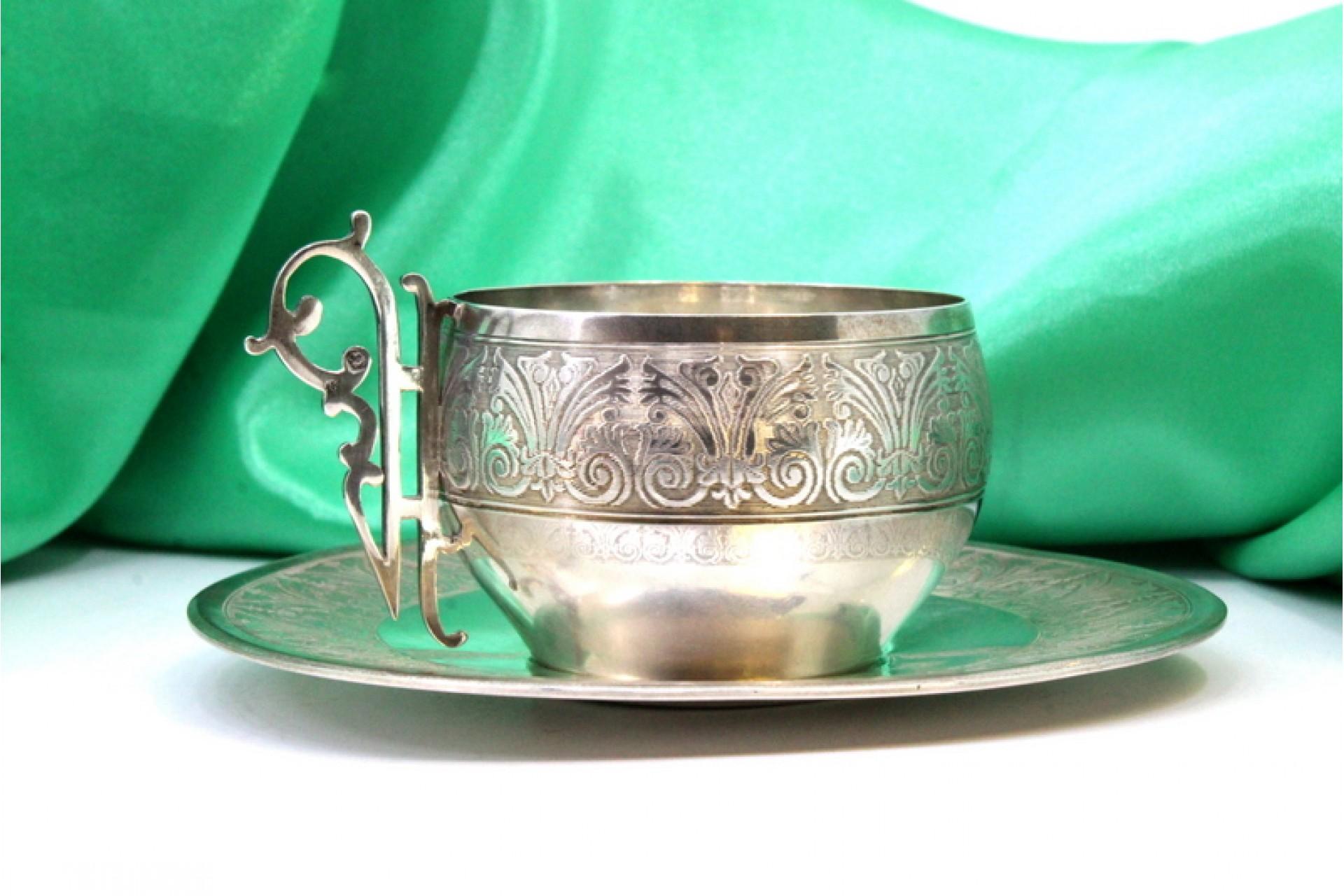 Silver cup and saucer with reliefs and cutouts on the handles im Angebot 1