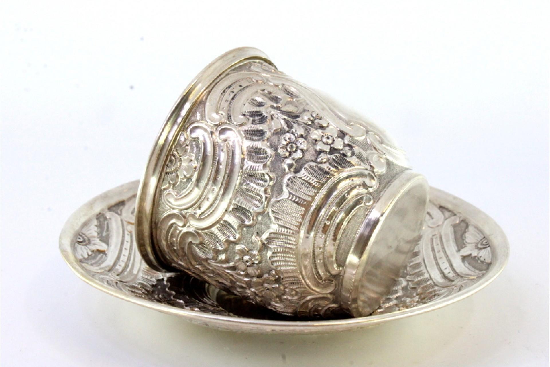 19th Century Silver cup and saucer with reliefs and gold interior For Sale