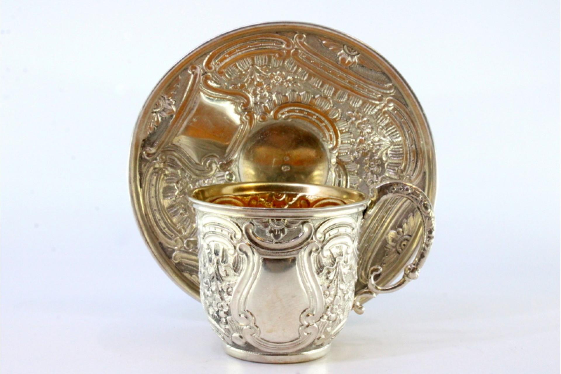 Silver cup and saucer with reliefs and gold interior For Sale 2