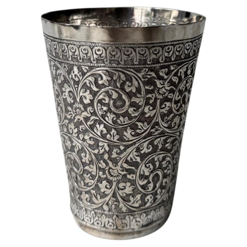 Silver cup from Sri Lanka, richly worked with arabesque decoration