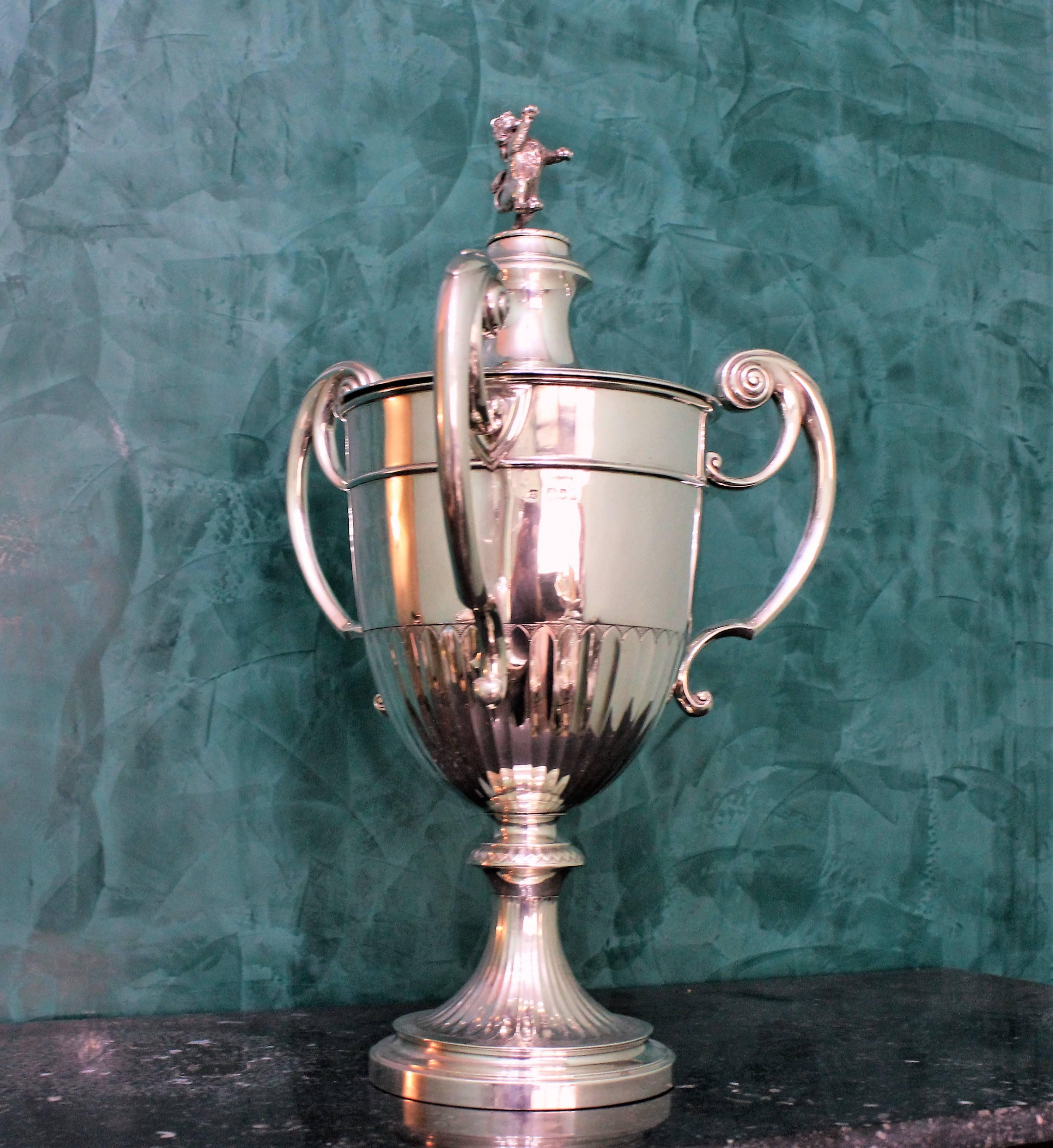 Silver cup/trophy with three handles and lion sculpture on top, realized by Goldsmiths & Silversmiths CO by William Gibson & John Lawrence Langman - London, England
Goldsmiths & Silversmiths Co (William Gibson & John Lawrence Langman)
Hallmarks