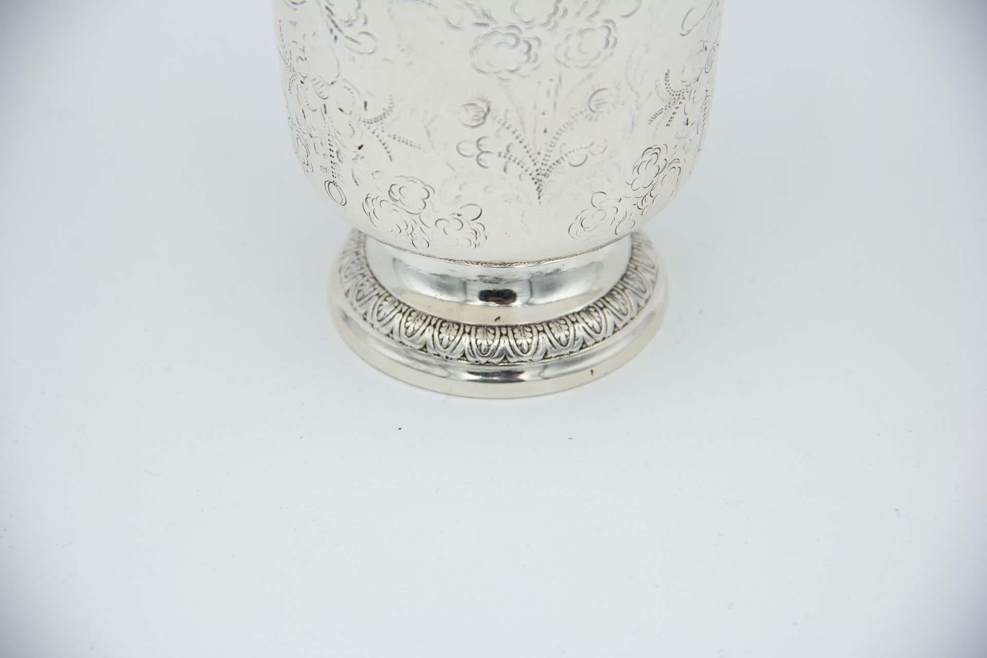 Description: Silver cup with floral motifs. Metal: Silver. Origin: French. Brand: Warrior with helmet. Weight: 111.51 grams. Dimensions: 9cmx12.1cm. Content: 950/1000. Assay Mark: Yes, since 1809. Additional information: Good condition.